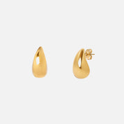 Gold drop stud earrings on a white background