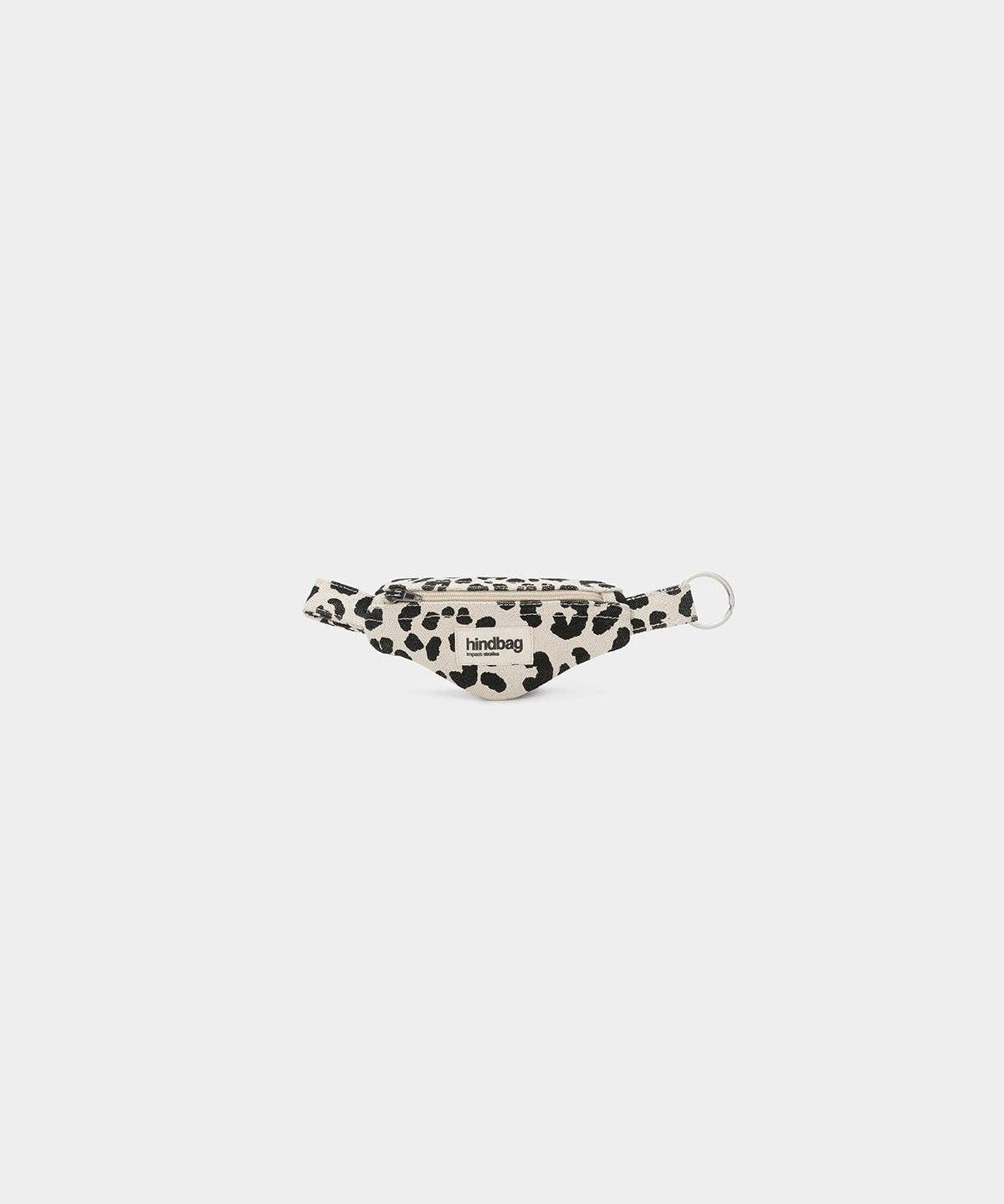 Leopard print banana keyring on a white background