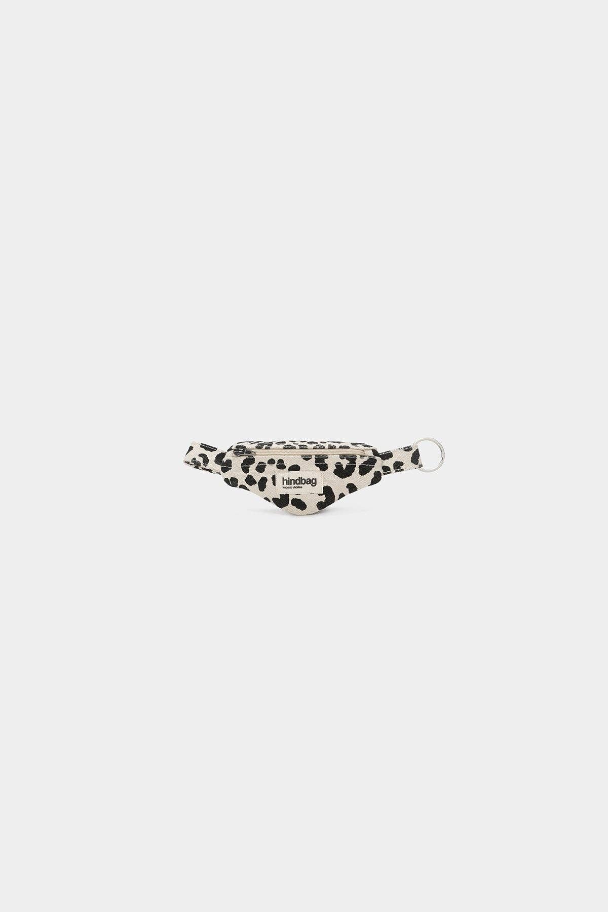 Leopard print banana keyring on a white background
