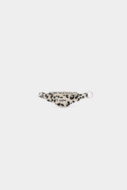 Leopard print banana keyring on a white background