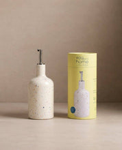 Party white speckled stoneware oil and vinegar dispenser by Egg Back Home