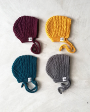Hand crocheted winter bonnets by EKA