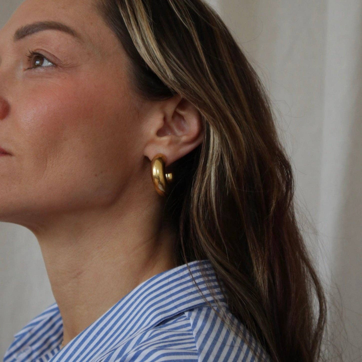 And Danu small Tern hoop earrings, further view