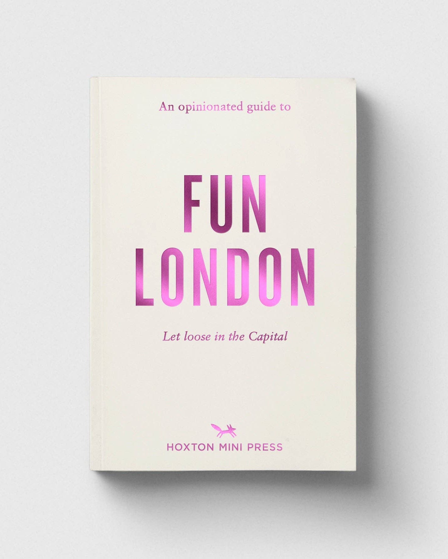 Book titled 'An Opinionated Guide to Fun London' by Hoxton Mini Press on a light gray background