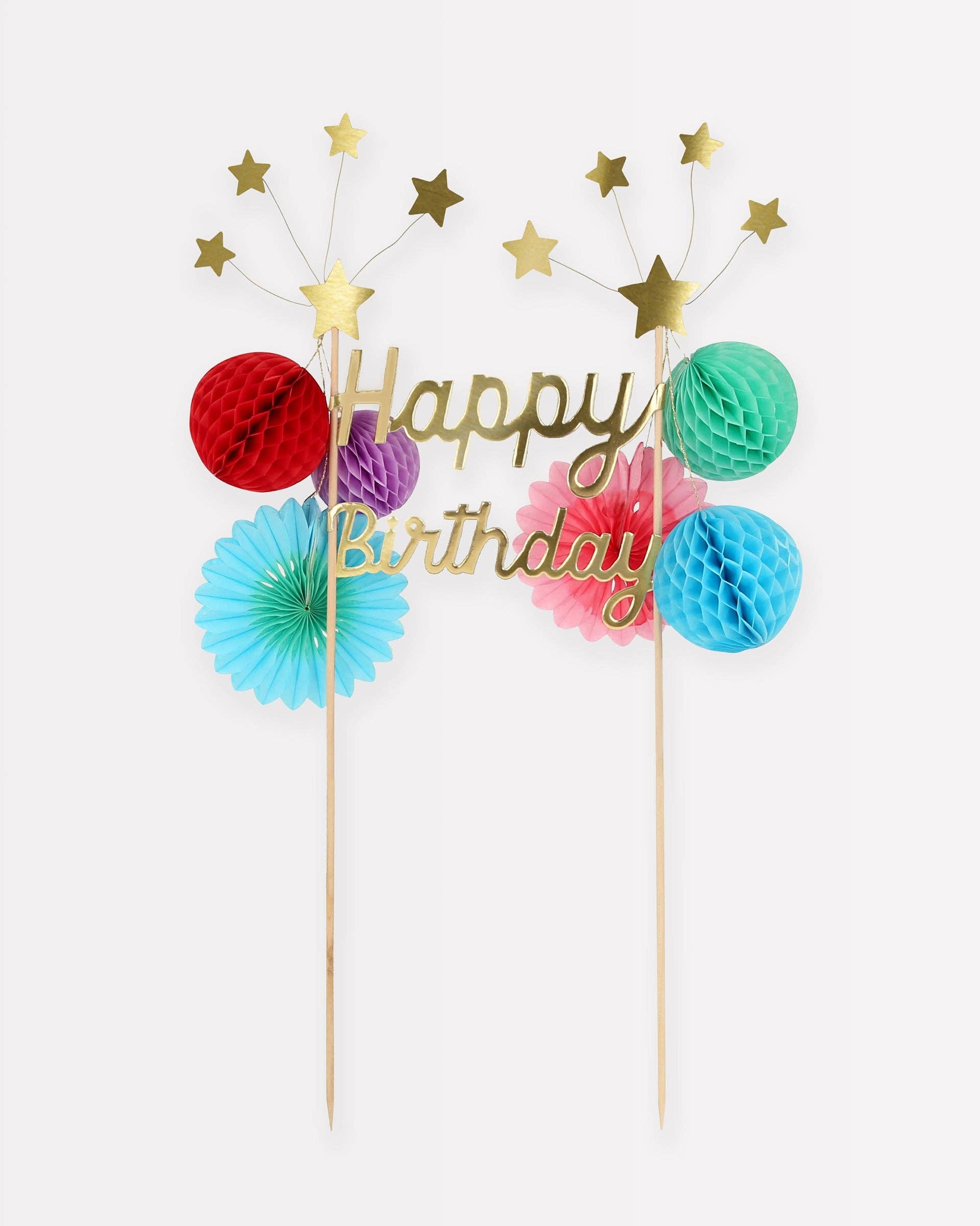 Colorful 'Happy Birthday' cake topper with decorative elements on a white background