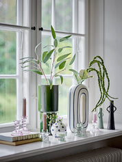 Fian vase on a window seal with other bloomingville vases