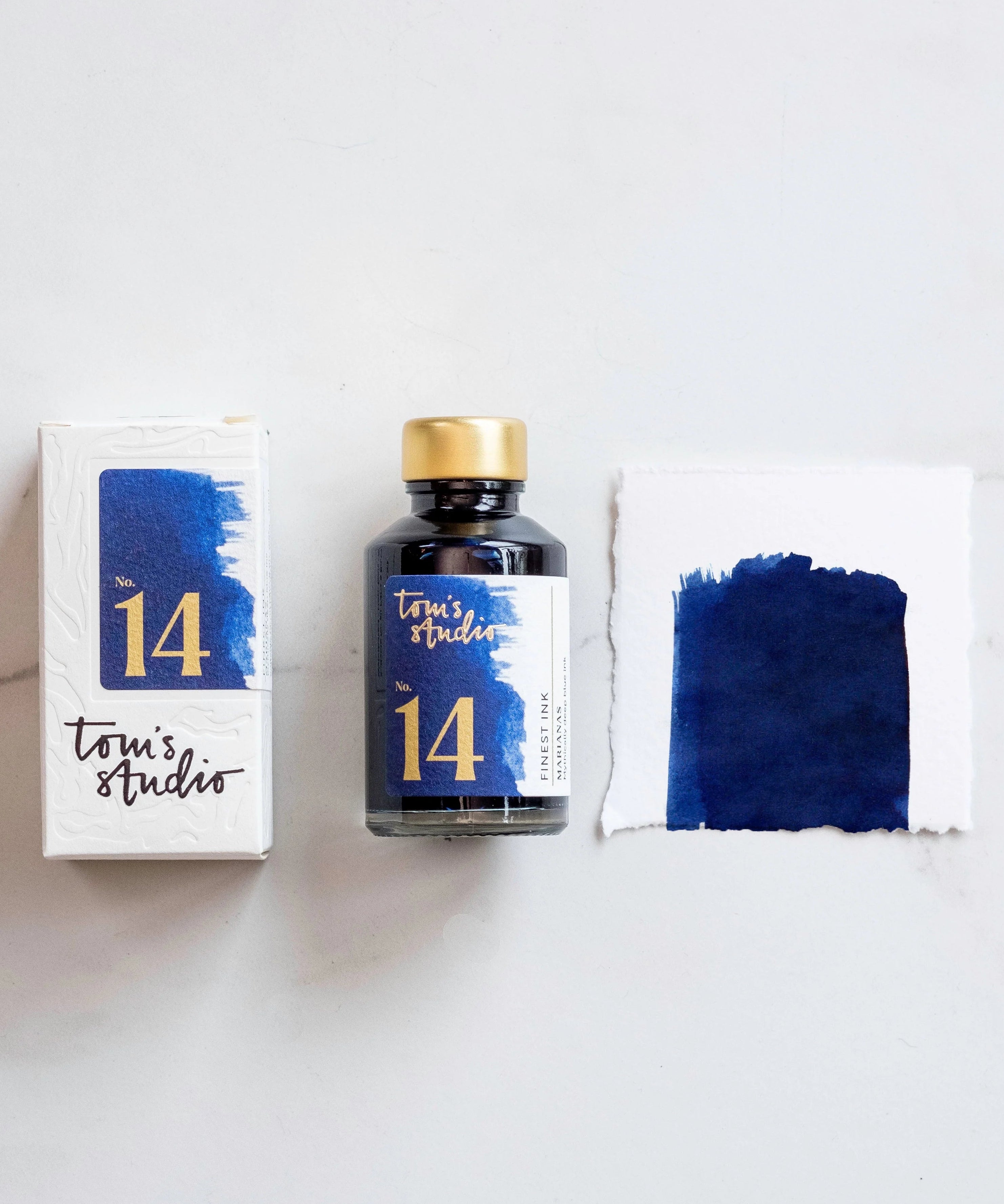 fountain-pen-ink-marianas-packaging-bottle-swatch.webp