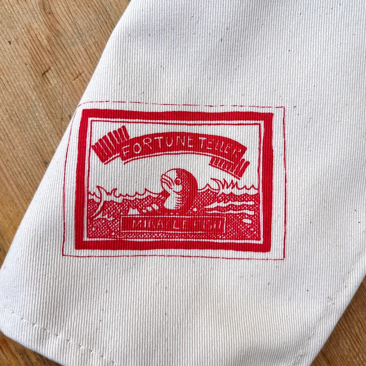 Set of 6 100% cotton Christmas Cracker Napkins by Lottie Day, featuring printed cracker prizes