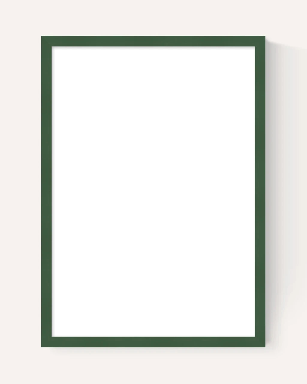 A minimalist vertical picture frame with a dark forest green border and a white center, shown on a light beige background with a soft drop shadow.