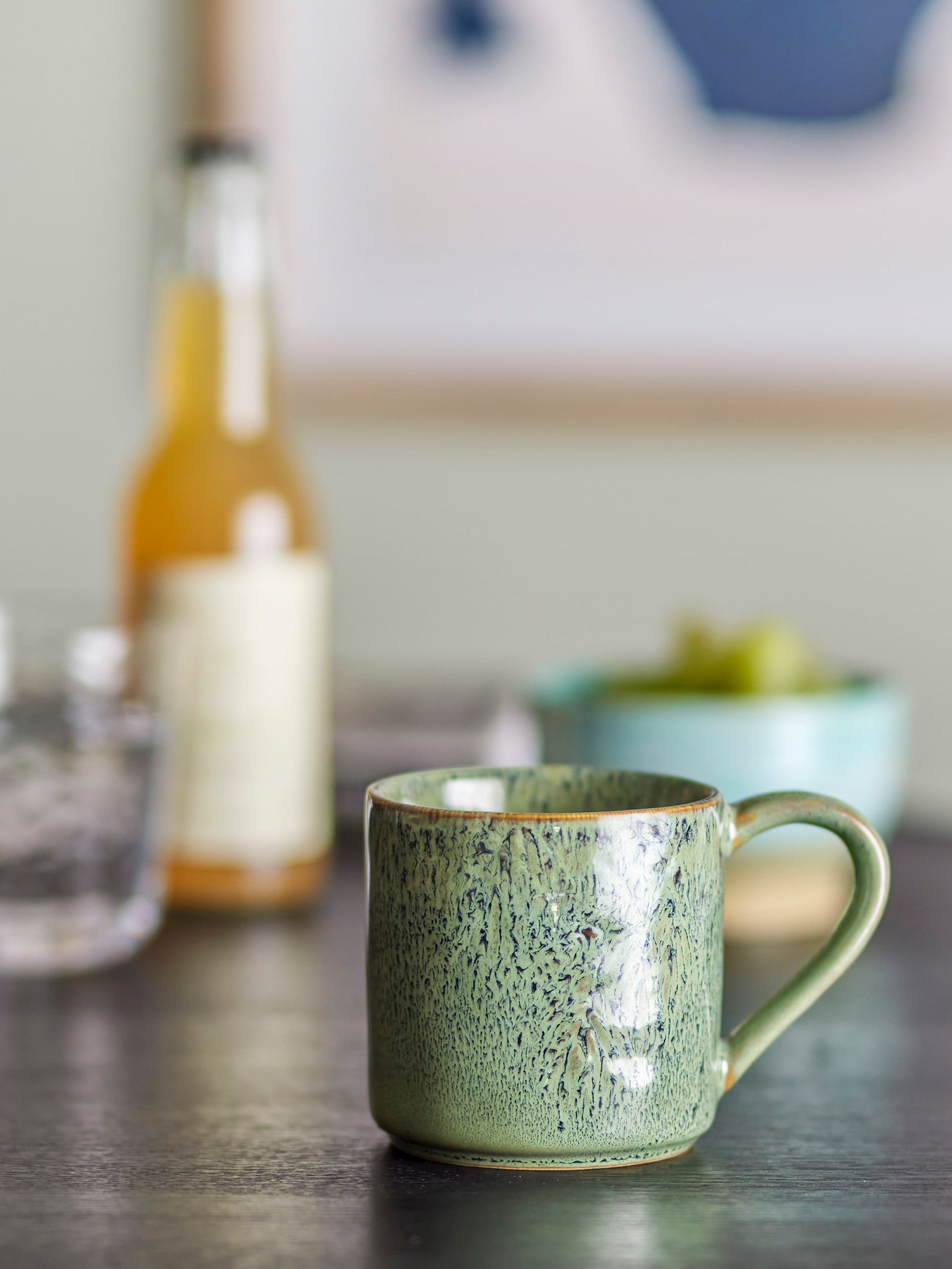 The Every Space hand-decorated Feras Cup or Mug in a raw reactive green glaze by Bloomingville