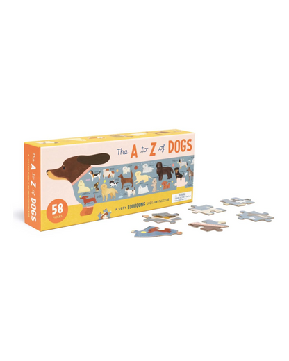 puzzle box showing a sausage dog shaped puzzle with a body made of many breeds of dogs. Each puzzle piece is quite large. For children