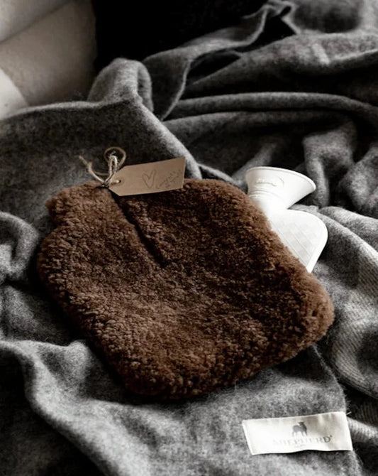The Every Space Kerri sheepskin hot water bottle cover by Shepherd of Sweden is super soft with a zipper front