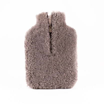 The Every Space Kerri sheepskin hot water bottle cover in stone by Shepherd of Sweden is super soft with a zipper front
