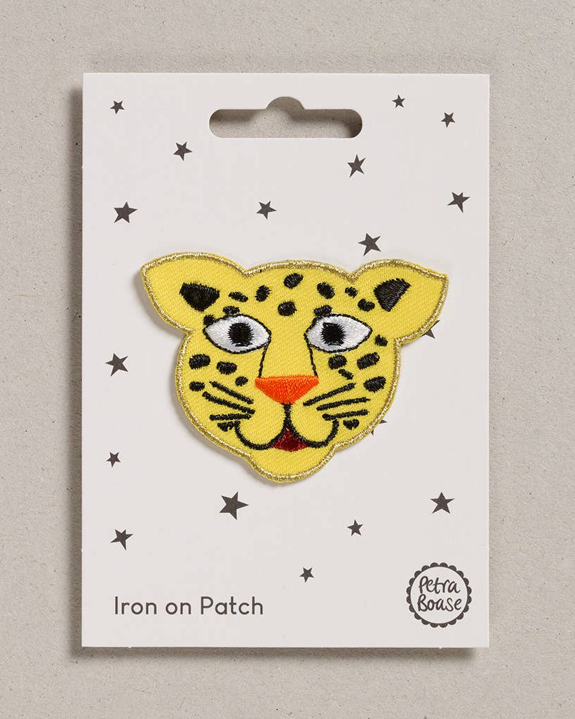 Petra Boase leopard face iron-on embroidered patch on neutral background