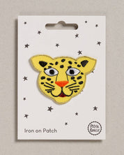 Petra Boase leopard face iron-on embroidered patch on neutral background