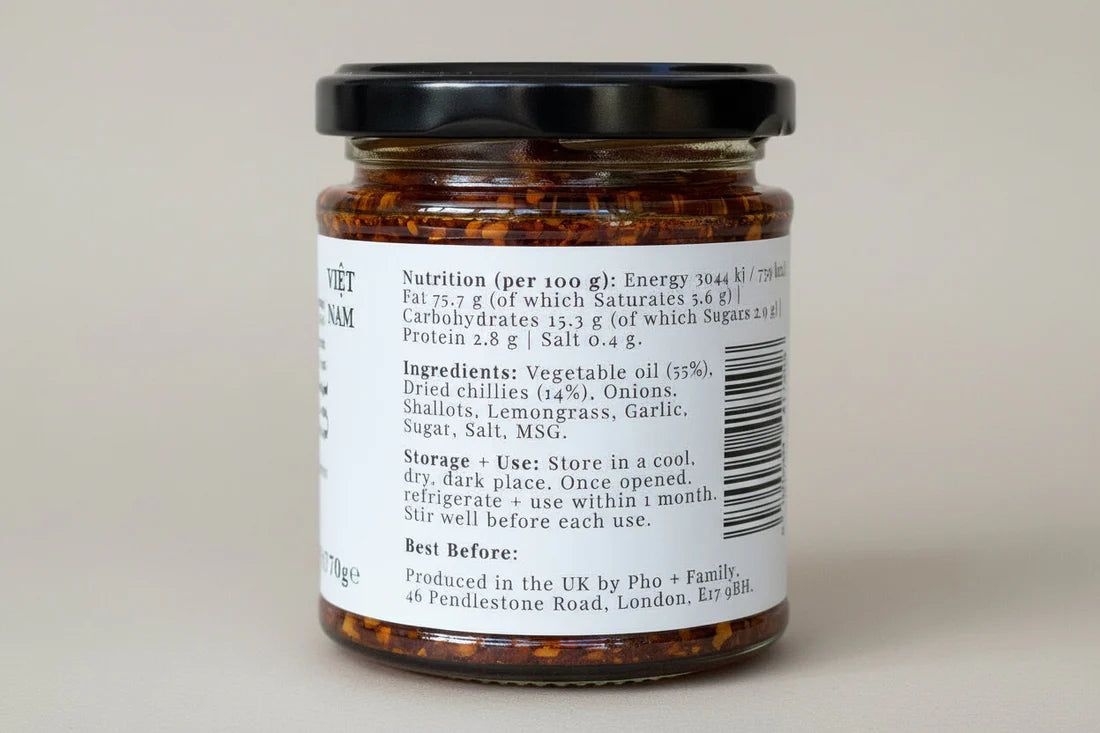 Jar with a label showing nutritional information and ingredients on a plain background