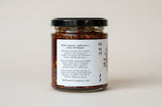Jar of Má Chá Vietnamese dipping sauce with a label on a light background