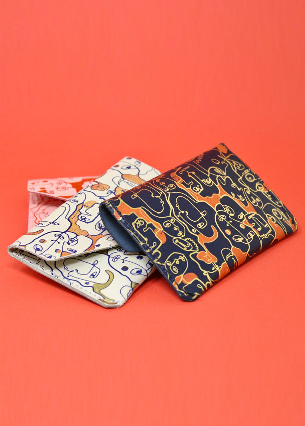 Many Faces Popper Purse