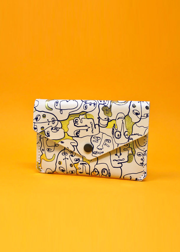 Many Faces Popper Purse