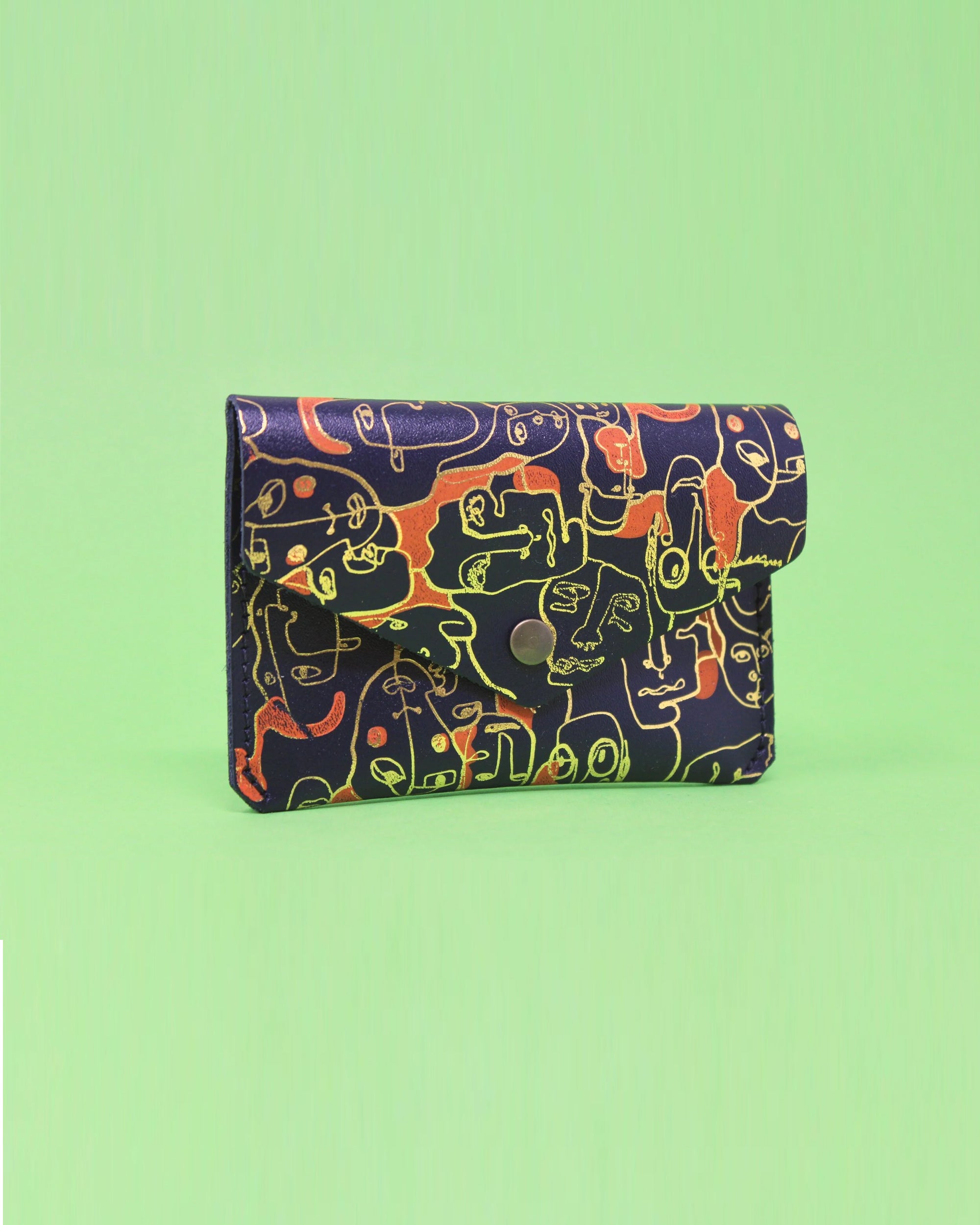 Many Faces Popper Purse