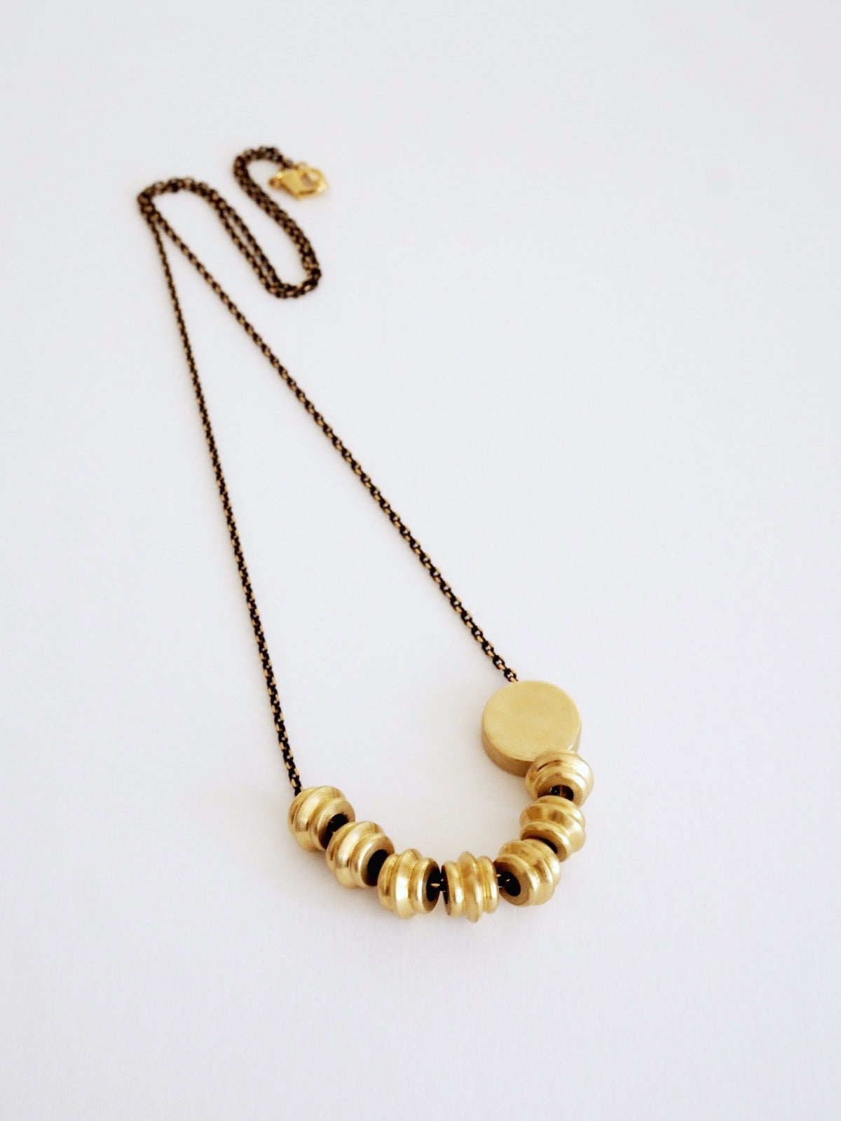 Brass and Bold Necklace | Nucleo, Brass Totems and Brass Disc
