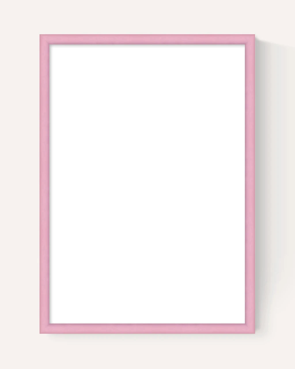 A minimalist vertical picture frame with a light pink border and a blank white center, shown against a warm off-white background with a soft drop shadow.