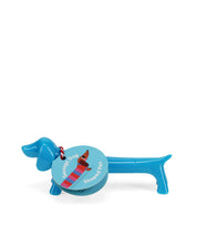 Blue dog-shaped keychain with a round tag on a white background