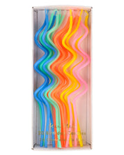 Box of colorful wavy candles with 'Meri Meri' branding on a white background