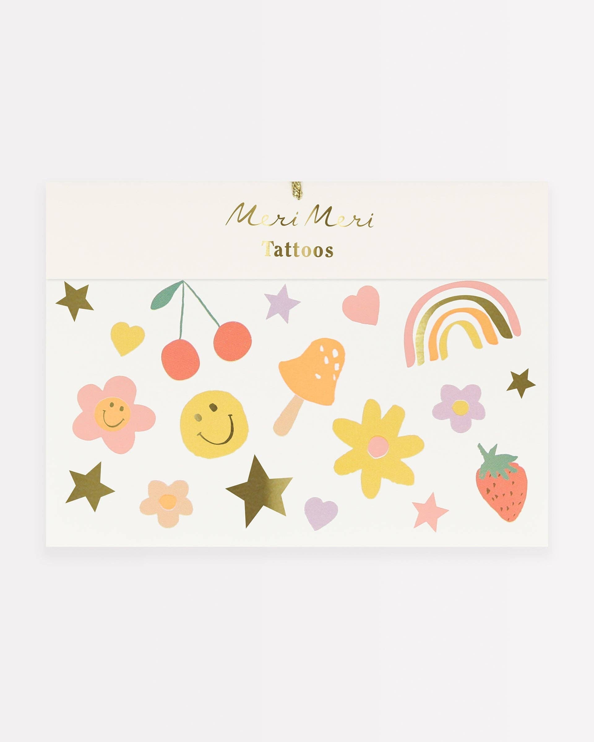Sheet of small tattoos with colorful designs on a white background