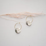Brass and Bold Wavy Disc Hoop Earrings | Ninkari, Gold and Silver