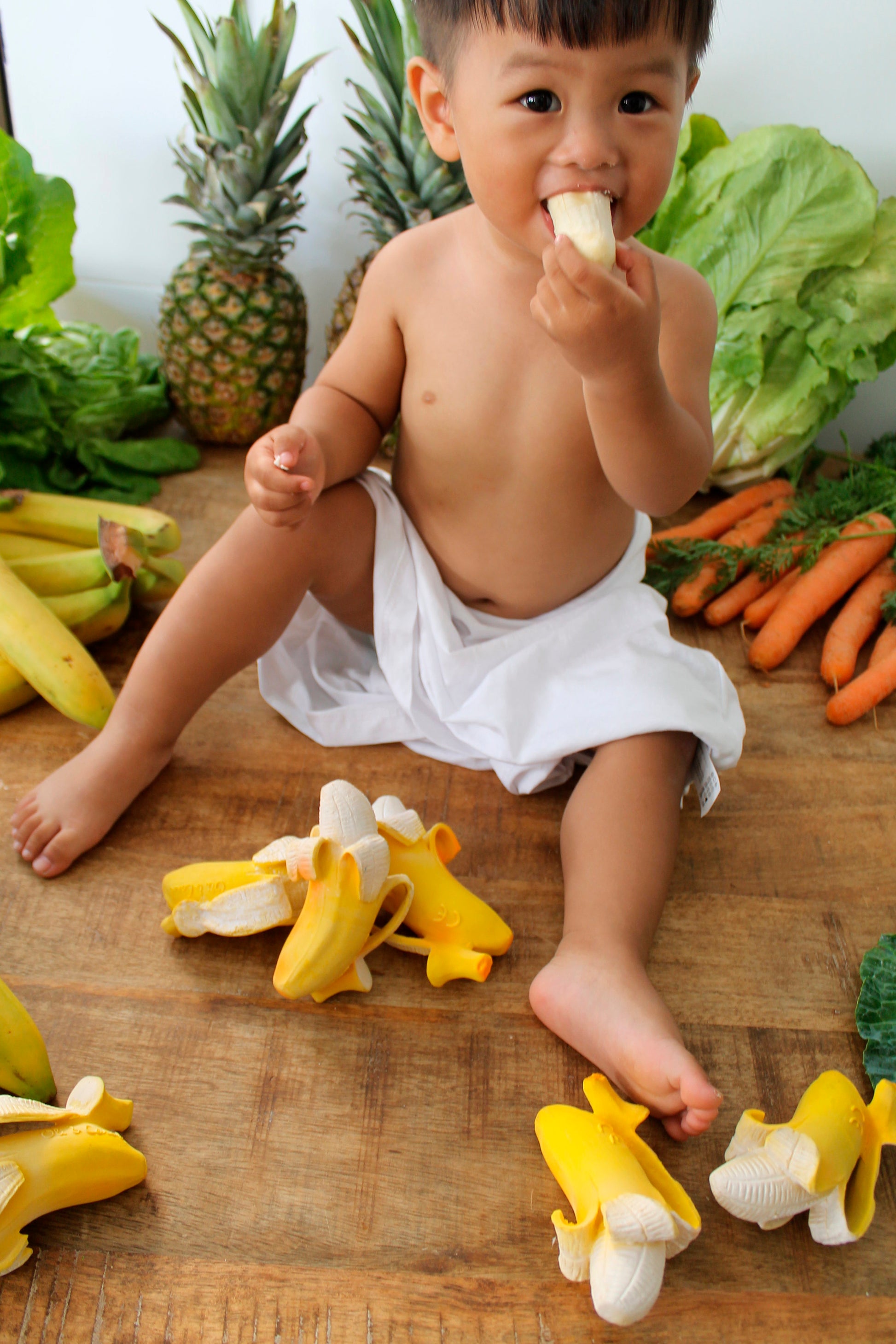 The Every Space Ana Banana natural rubber chewable teether by Oli & Carol