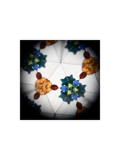 The Every Space Astronomy Kaleidoscope in blue with moon and star decoration by Rex London