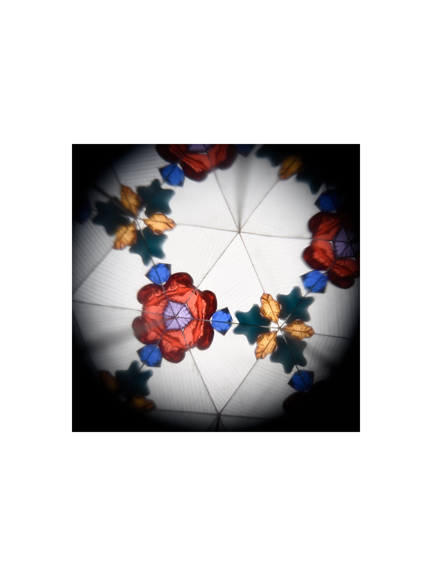 The Every Space Astronomy Kaleidoscope in blue with moon and star decoration by Rex London