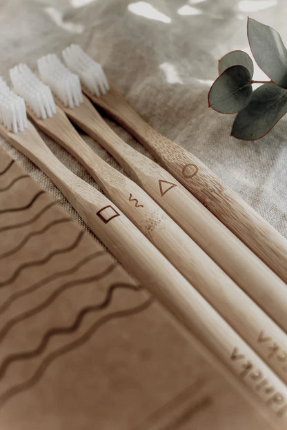 The Every Space box of 4 Bamboo Toothbrushes with soft waveform bristles by Goldrick