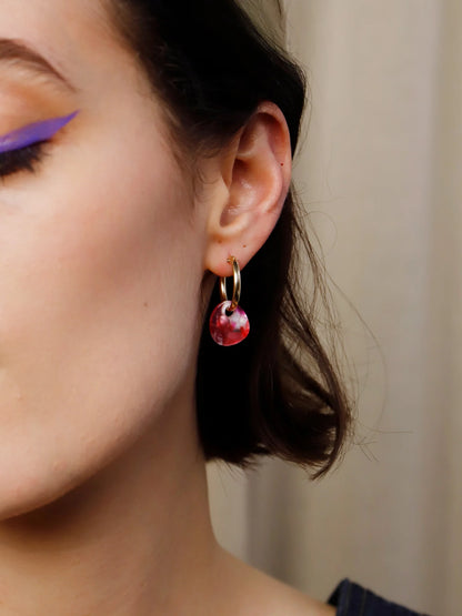 The Every Space Beatrice hoop earrings in filled gold and raspberry acrylic by Wolf & Moon