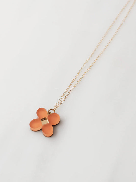 The Every Space Bella necklace with filled gold chain and terracotta acrylic pendant by Wolf & Moon
