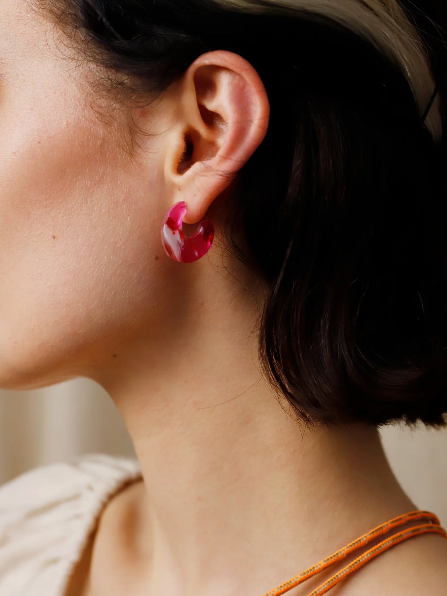 The Every Space Cassia hoop earrings in sterling silver and raspberry acrylic by Wolf & Moon