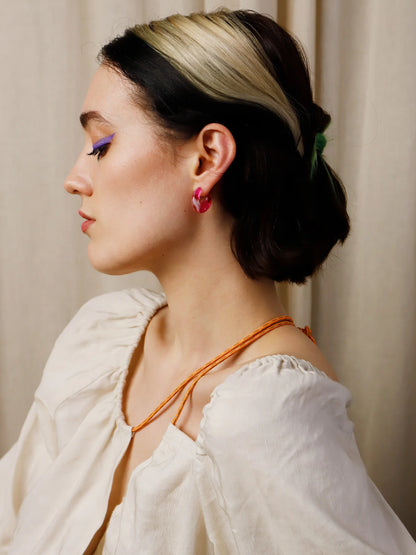 The Every Space Cassia hoop earrings in sterling silver and raspberry acrylic by Wolf & Moon