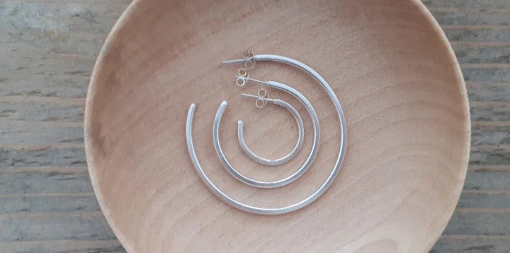 The Every Space silver hoop earrings handmade using recycled silver by Clare Elizabeth Kilgour, with sterling silver pins and scrolls