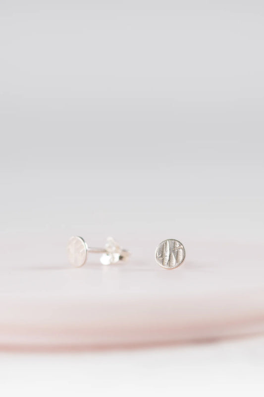 The Every Space handmade textured stud earrings in sterling silver with sterling silver pins and scrolls by Clare Elizabeth Kilgour