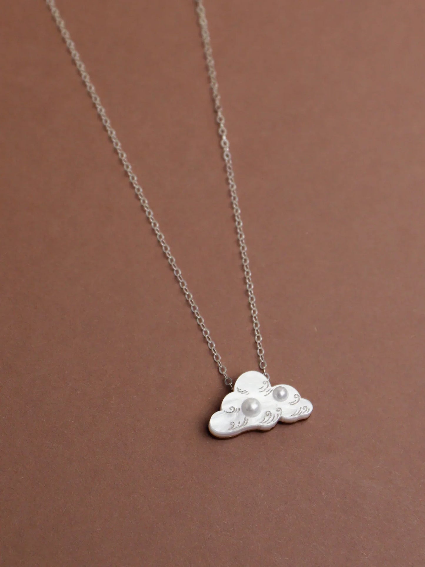 The Every Space Cloud necklace in sterling silver and acrylic by Wolf & Moon