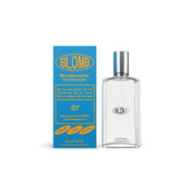 50ml Eau de Parfum bottle by Blomb, with a blue and yellow box packaging behind it. The bottle is clear with a silver cap.