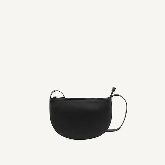 The Every Space high quality grain black vegan leather Half Moon shoulder bag with a black YKK zipper and an internal pocket by Monk & Anna