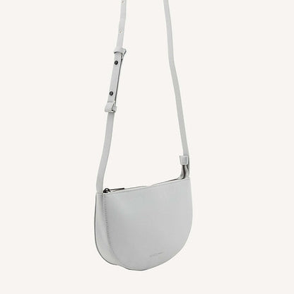 The Every Space high quality grain fog grey vegan leather Half Moon shoulder bag with a black YKK zipper and an internal pocket by Monk & Anna