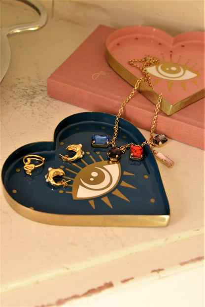 The Every Space brass and hand-enamelled heart-shaped Eye Trinket Dish with a gold eye motif by My Doris