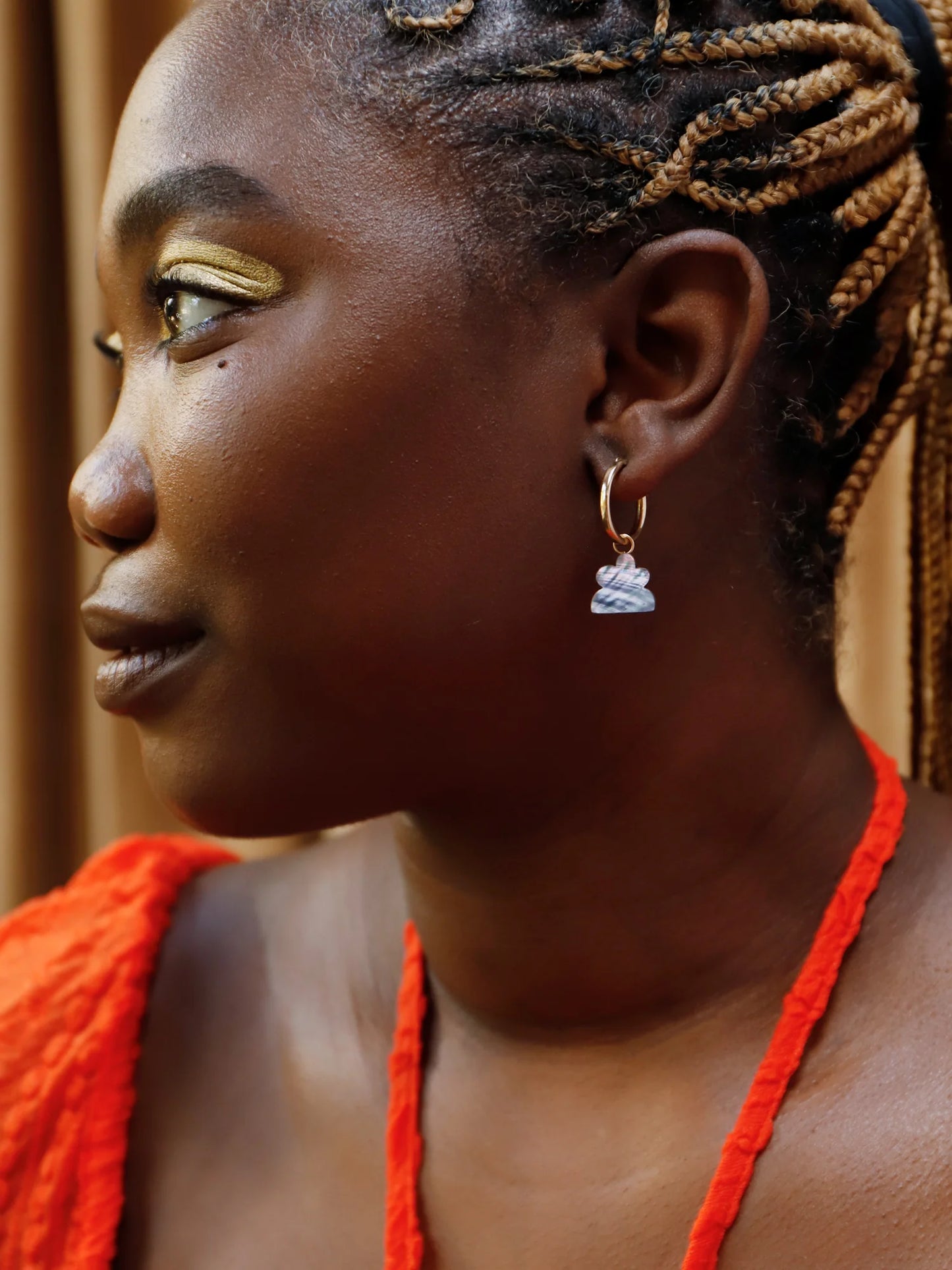 The Every Space Lena hoop earrings with gold filled hoops and iridescent shell veneer charms by Wolf & Moon