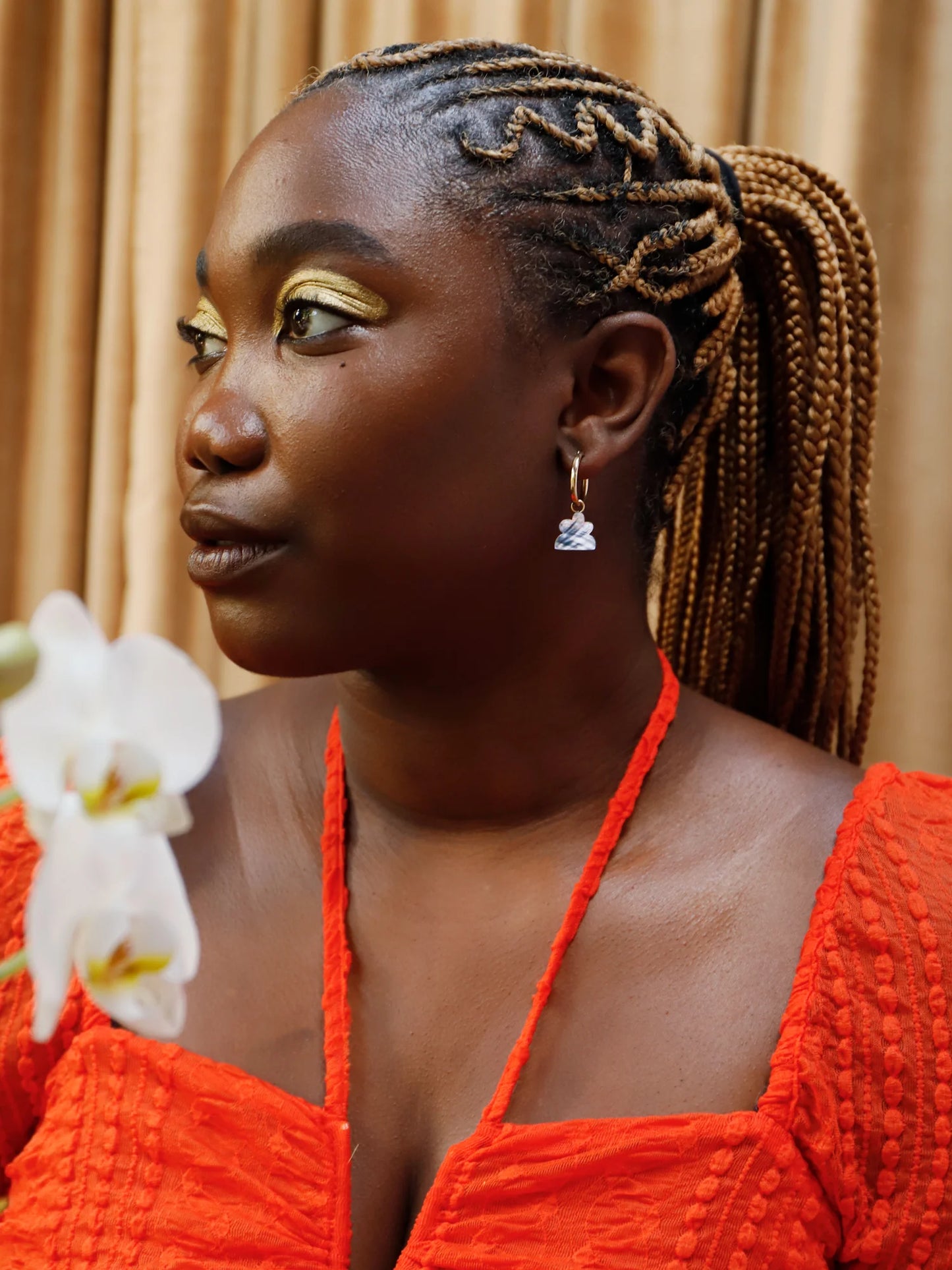 The Every Space Lena hoop earrings with gold filled hoops and iridescent shell veneer charms by Wolf & Moon