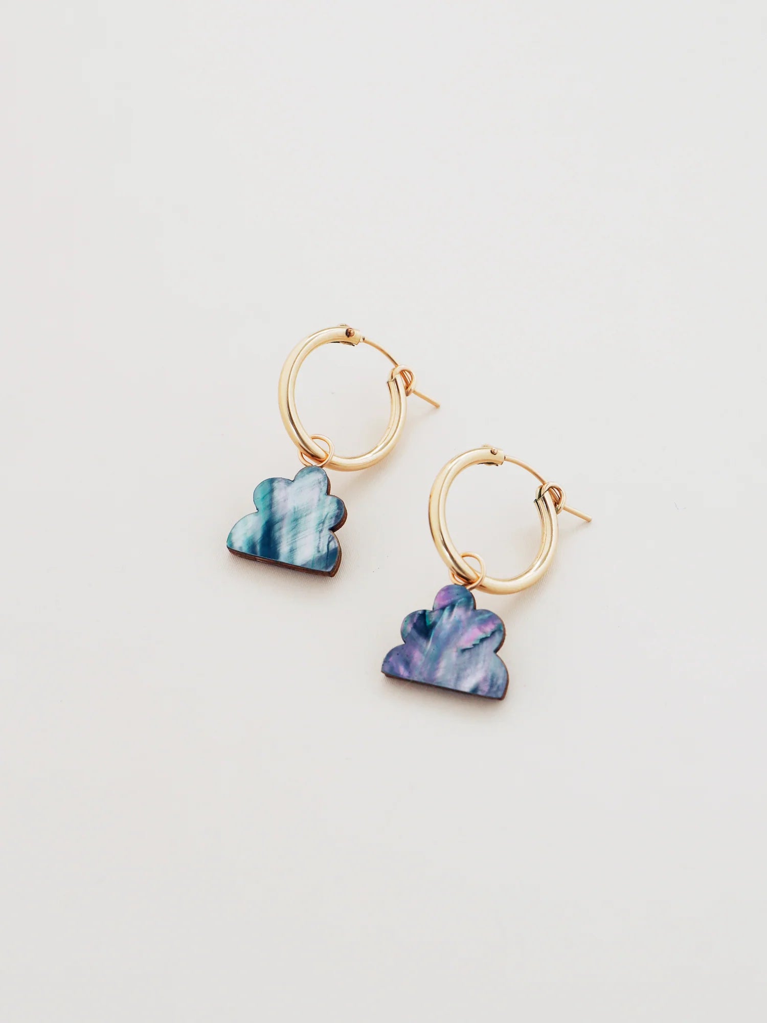 The Every Space Lena hoop earrings with gold filled hoops and iridescent shell veneer charms by Wolf & Moon