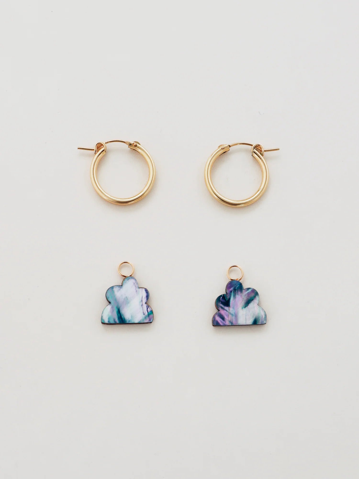 The Every Space Lena hoop earrings with gold filled hoops and iridescent shell veneer charms by Wolf & Moon