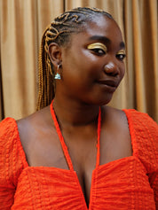 The Every Space Lena hoop earrings with gold filled hoops and iridescent shell veneer charms by Wolf & Moon